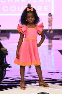 Child model on runway in Lagos.